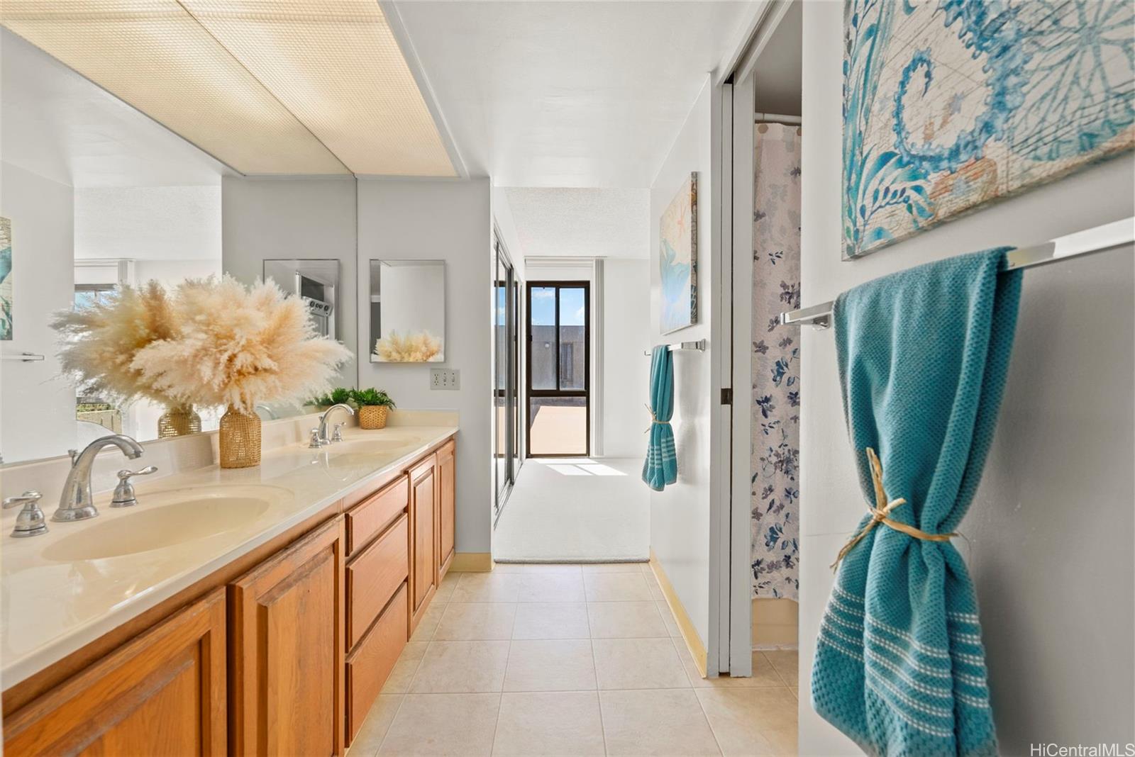 217 Prospect Street, Unit M10 Honolulu, HI 96813 - Photo 10 of 25 a bathroom with a sink a mirror and a shower