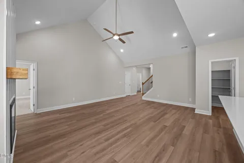 a kitchen with appliances a sink and cabinets