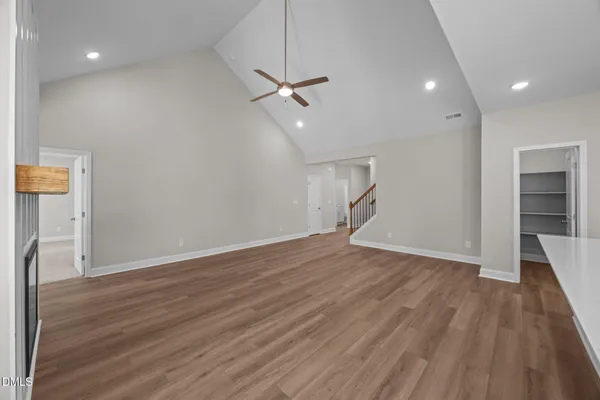 a kitchen with appliances a sink and cabinets