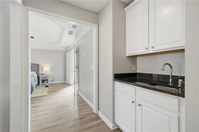 a spacious bathroom with a tub and shower