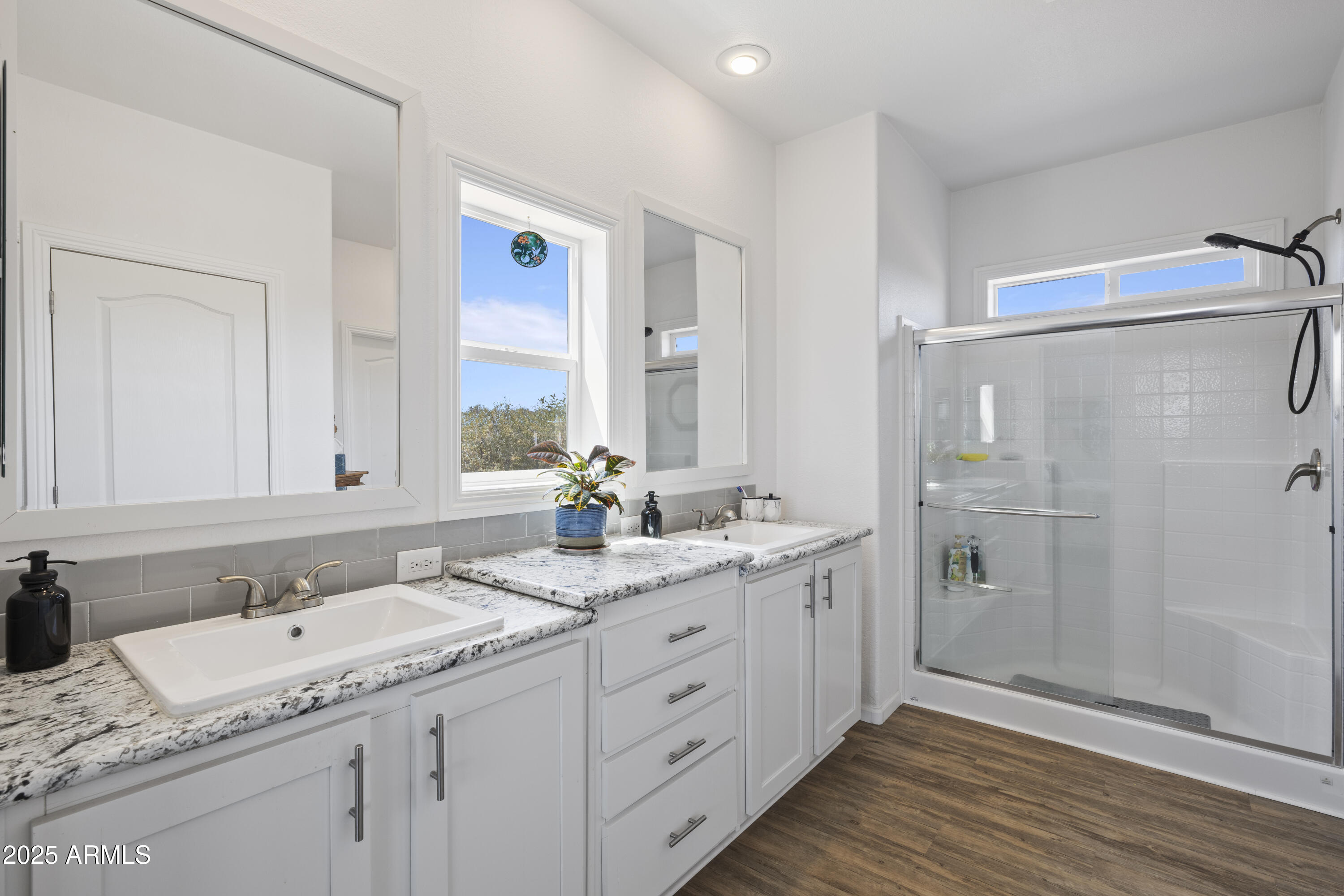 1235 North Harvest Road Dewey, AZ 86327 - Photo 13 of 37 a bathroom with a granite countertop double vanity sink mirror and