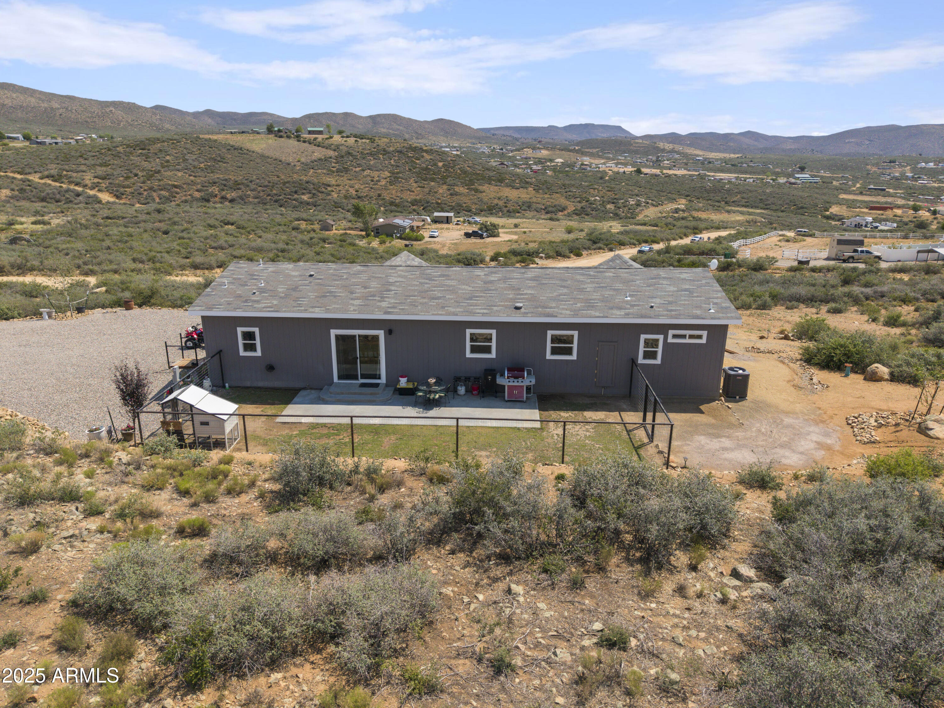 1235 North Harvest Road Dewey, AZ 86327 - Photo 25 of 37 a view of a lake with a mountain