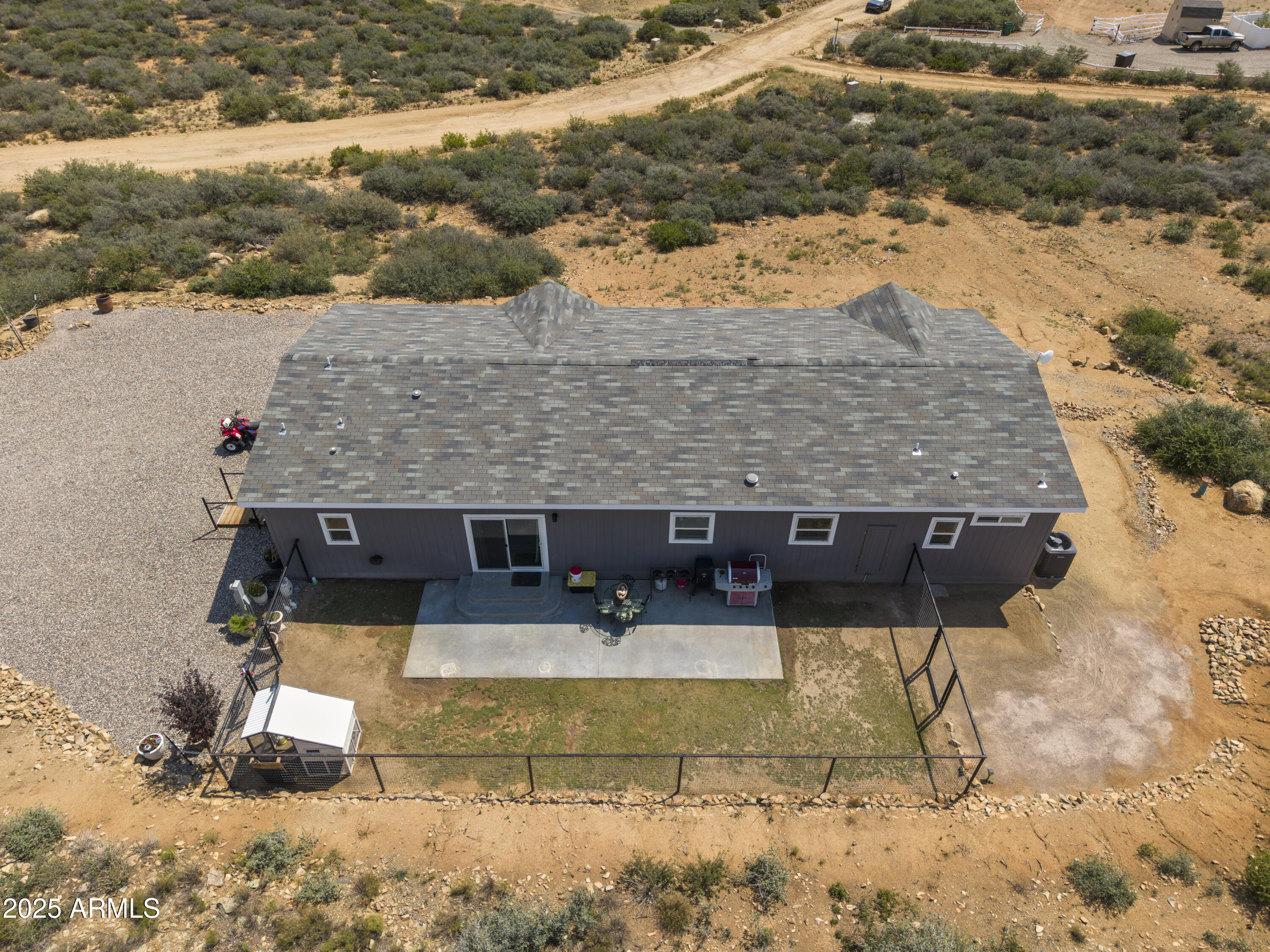 1235 North Harvest Road Dewey, AZ 86327 - Photo 26 of 37 a view of a house with a yard covered with snow