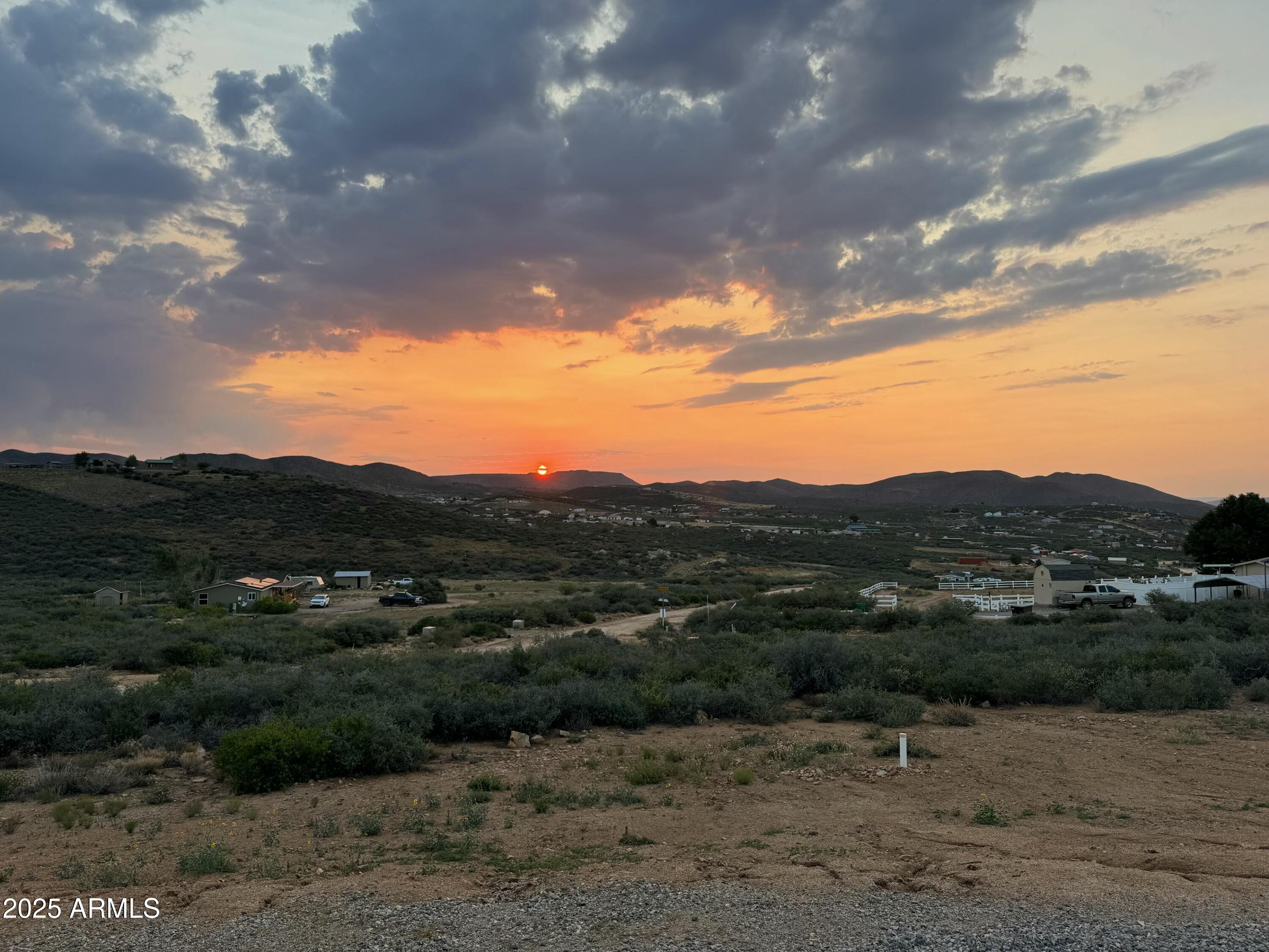 1235 North Harvest Road Dewey, AZ 86327 - Photo 30 of 37 a view of a town with mountains in the background