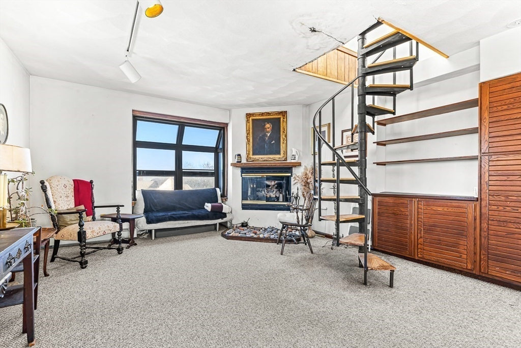 47 Prospect Avenue, Unit 47 Winthrop, MA 02152 - Photo 11 of 31 a view of livingroom with furniture and windows