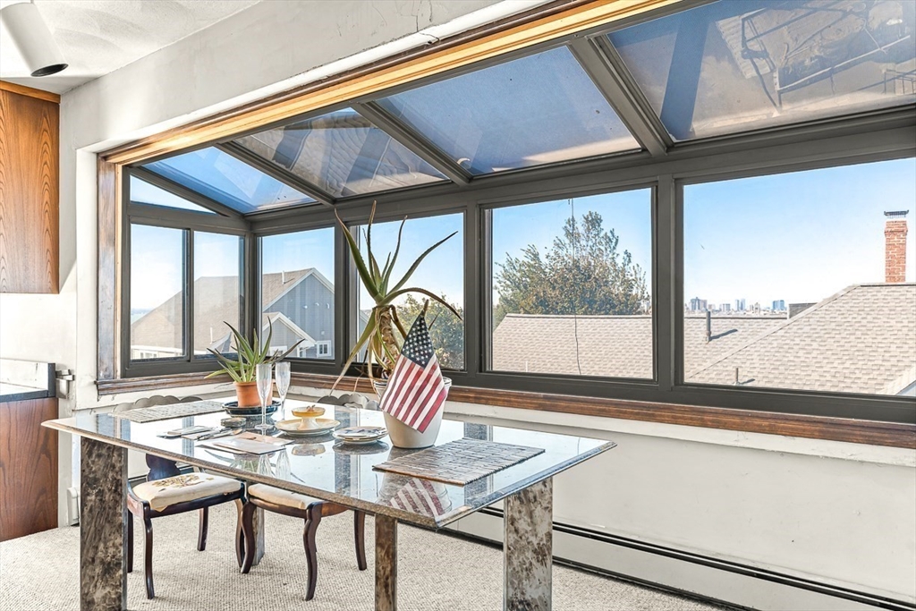 47 Prospect Avenue, Unit 47 Winthrop, MA 02152 - Photo 17 of 31 a outdoor dining space with furniture and outdoor view