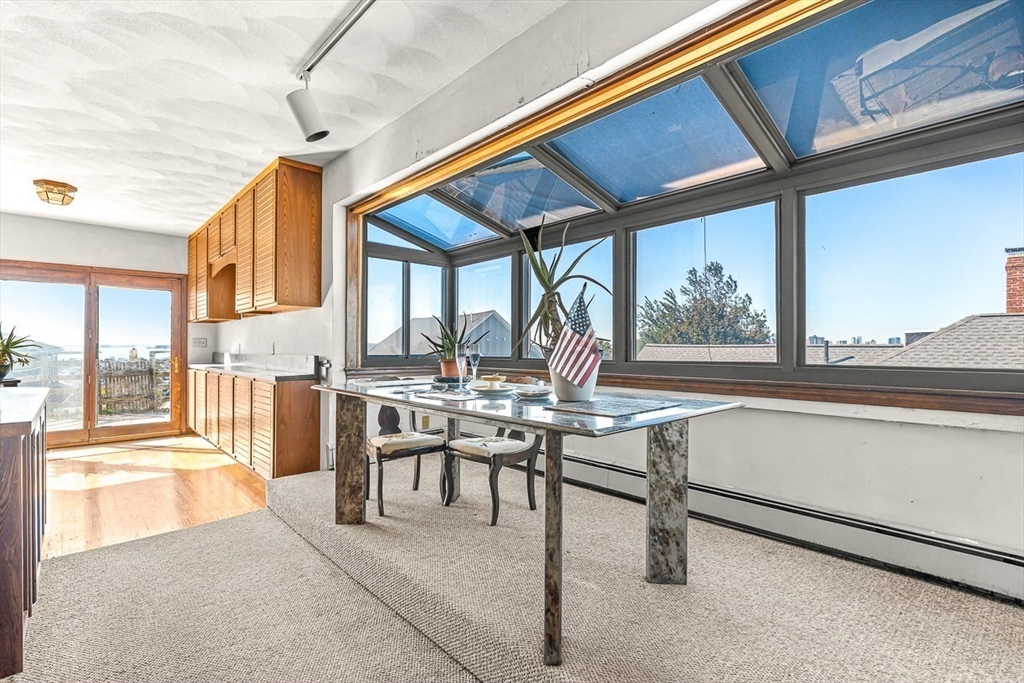 47 Prospect Avenue, Unit 47 Winthrop, MA 02152 - Photo 18 of 31 a view of a dining room with furniture window and outside view