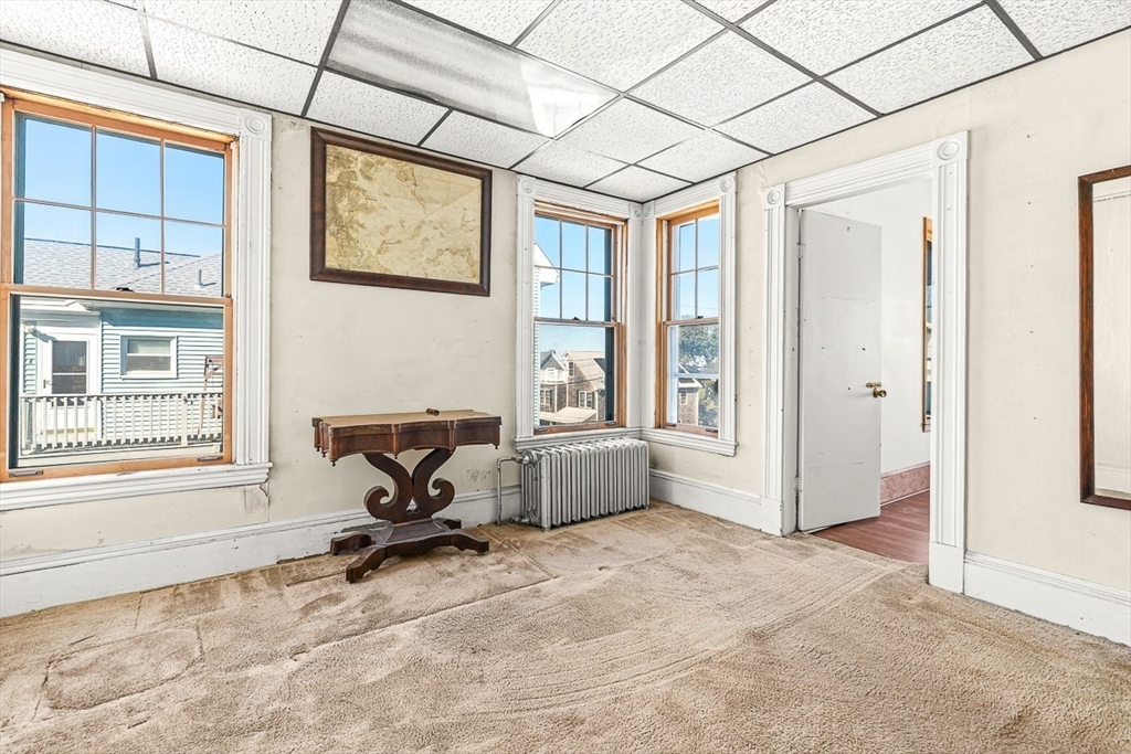 47 Prospect Avenue, Unit 47 Winthrop, MA 02152 - Photo 26 of 31 a workspace with furniture window and outside view