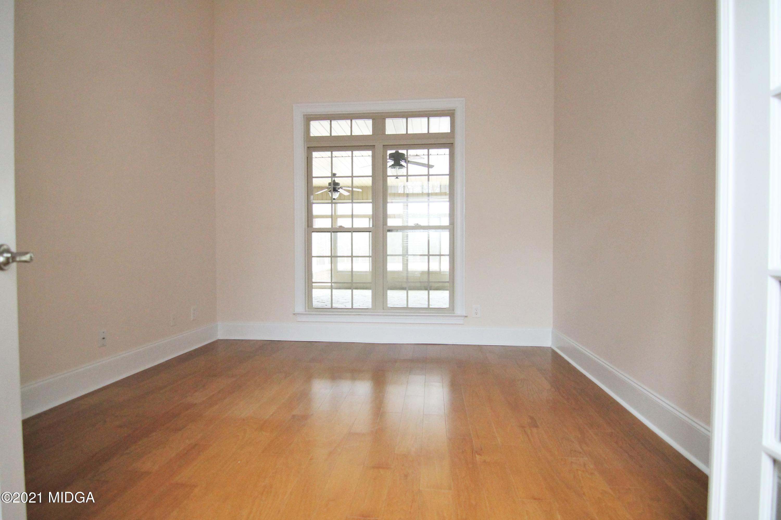 629 Toomer Road Perry, GA 31069 - Photo 17 of 59 an empty room with a window