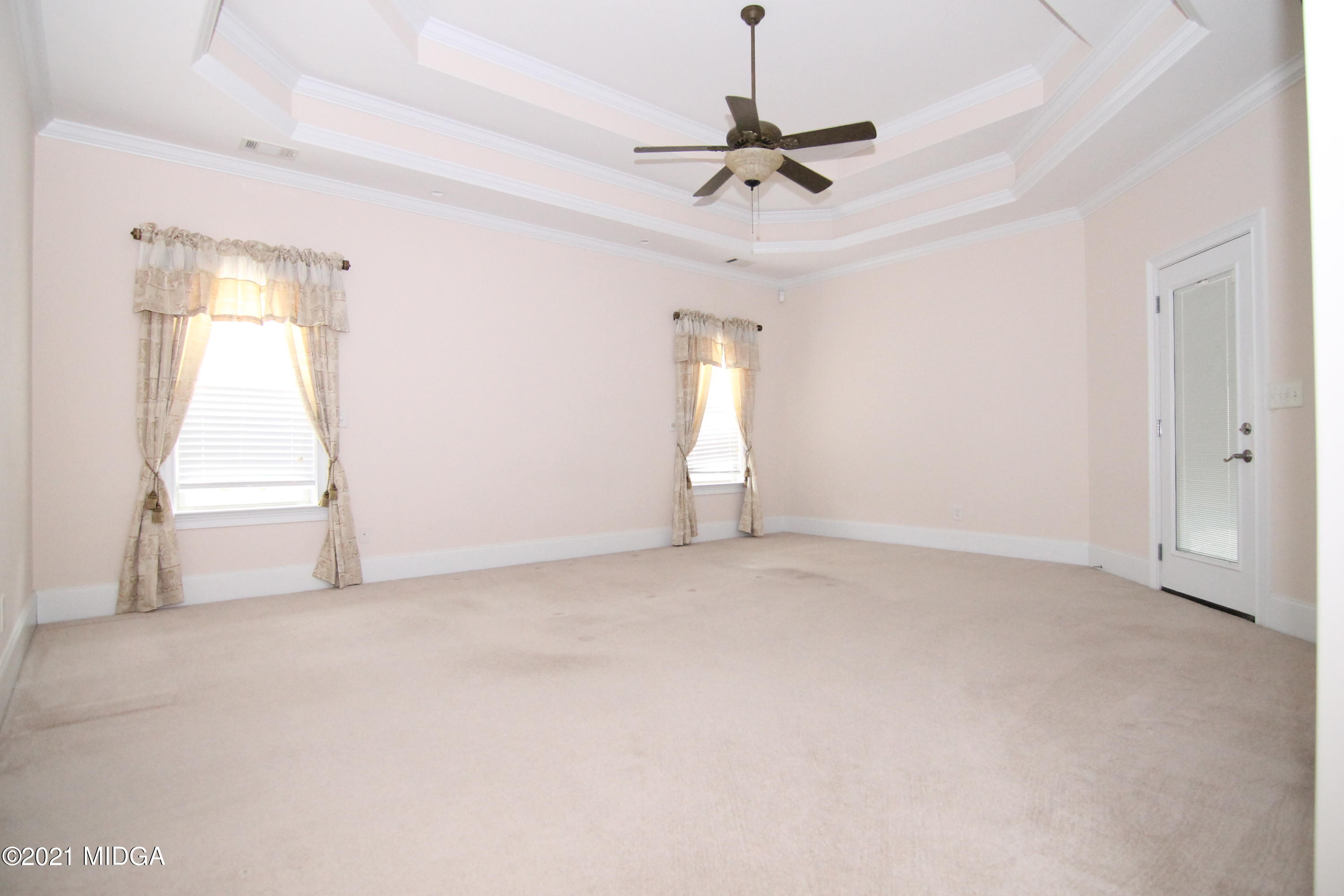 629 Toomer Road Perry, GA 31069 - Photo 19 of 59 a view of empty room with window