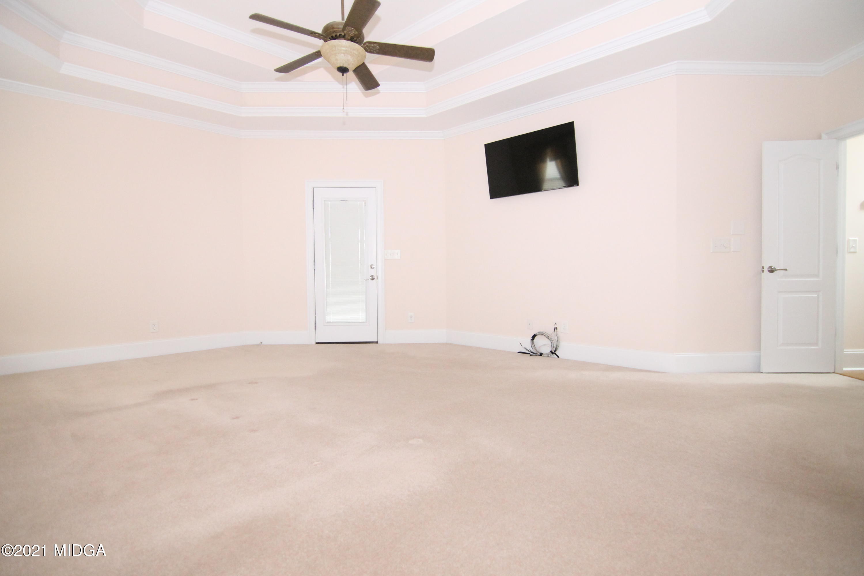 629 Toomer Road Perry, GA 31069 - Photo 20 of 59 a view of a livingroom with a flat screen tv