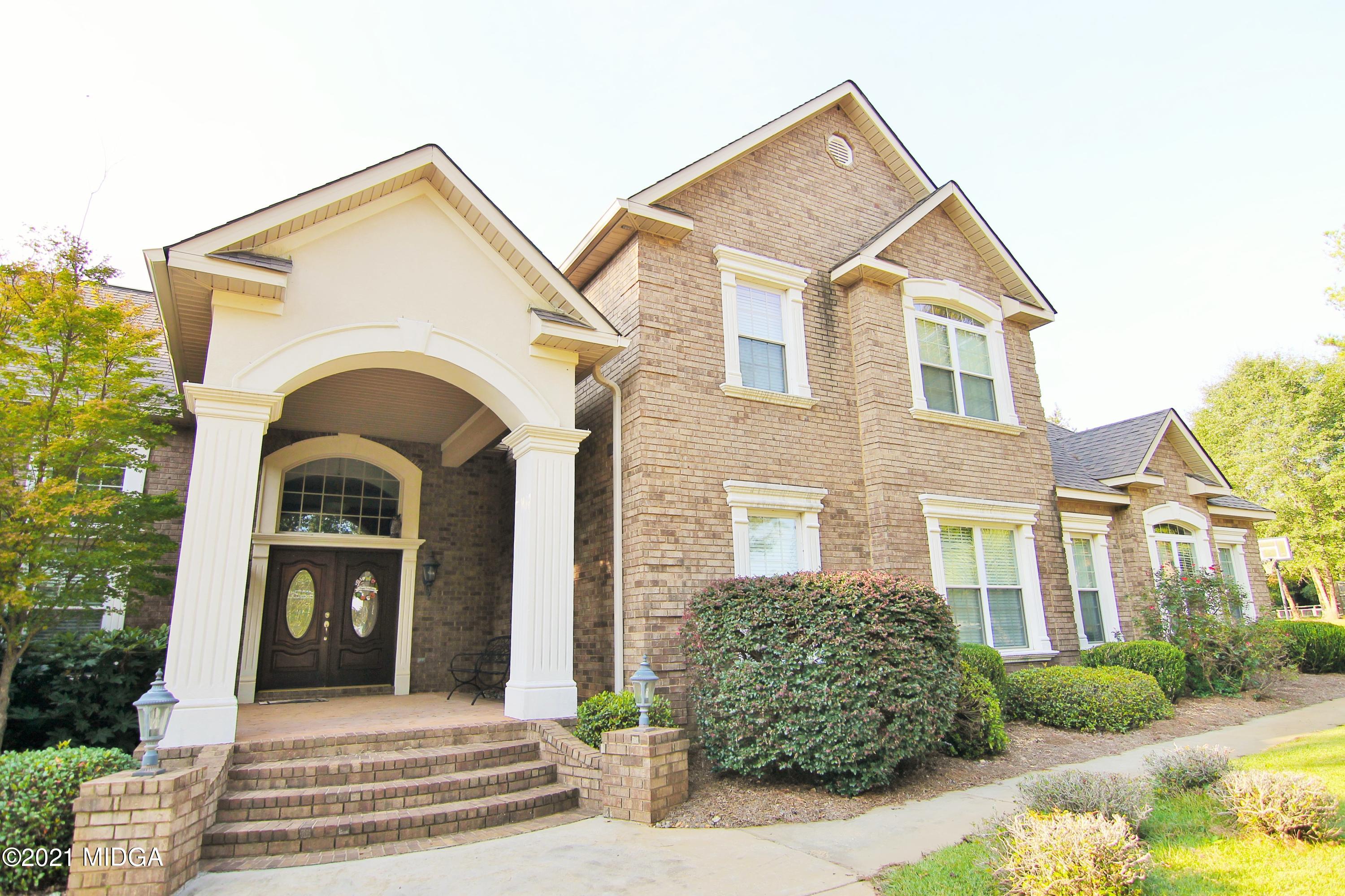 629 Toomer Road Perry, GA 31069 - Photo 3 of 59 a front view of a house
