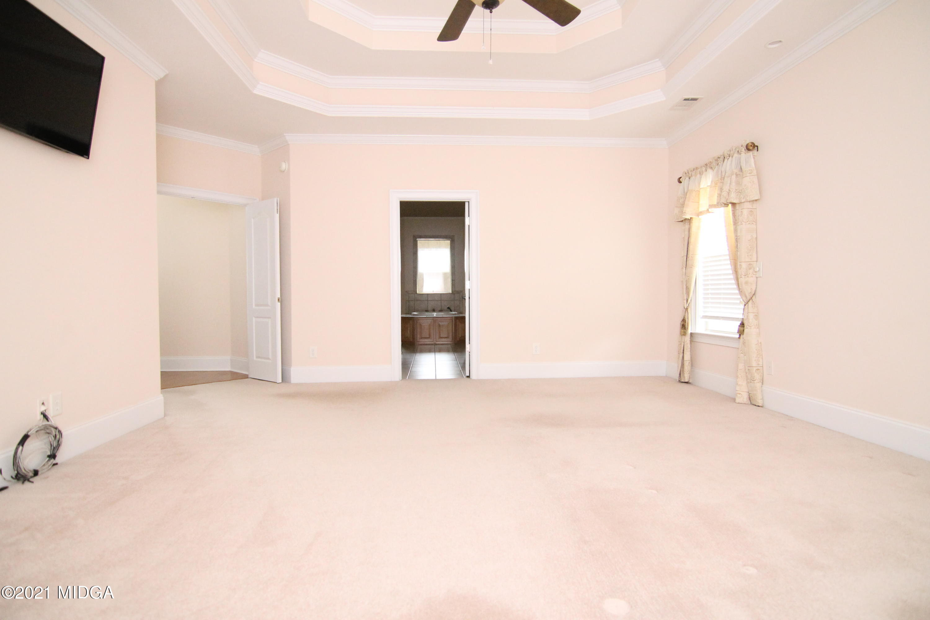 629 Toomer Road Perry, GA 31069 - Photo 22 of 59 a view of an empty room with a window