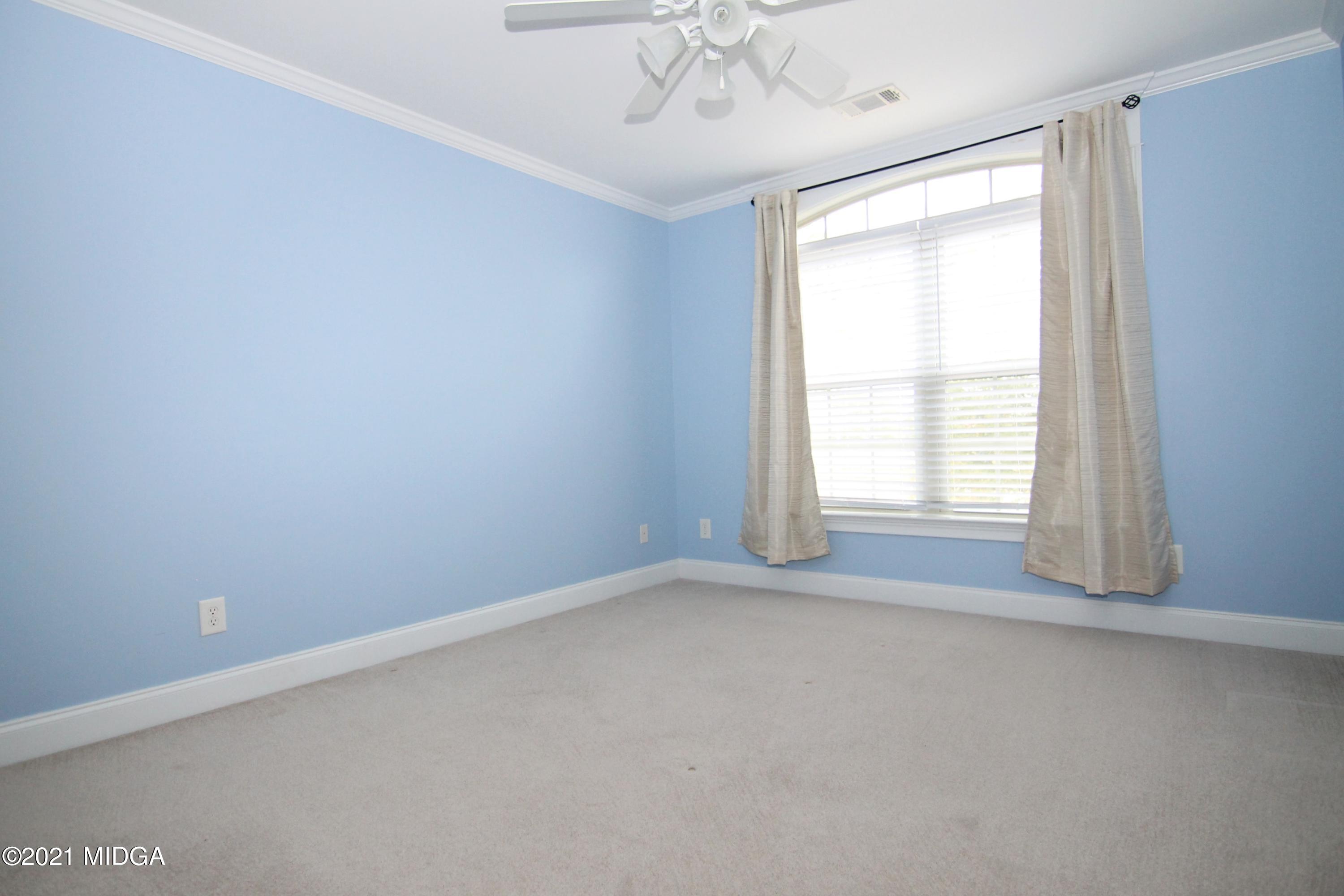629 Toomer Road Perry, GA 31069 - Photo 35 of 59 an empty room with a window