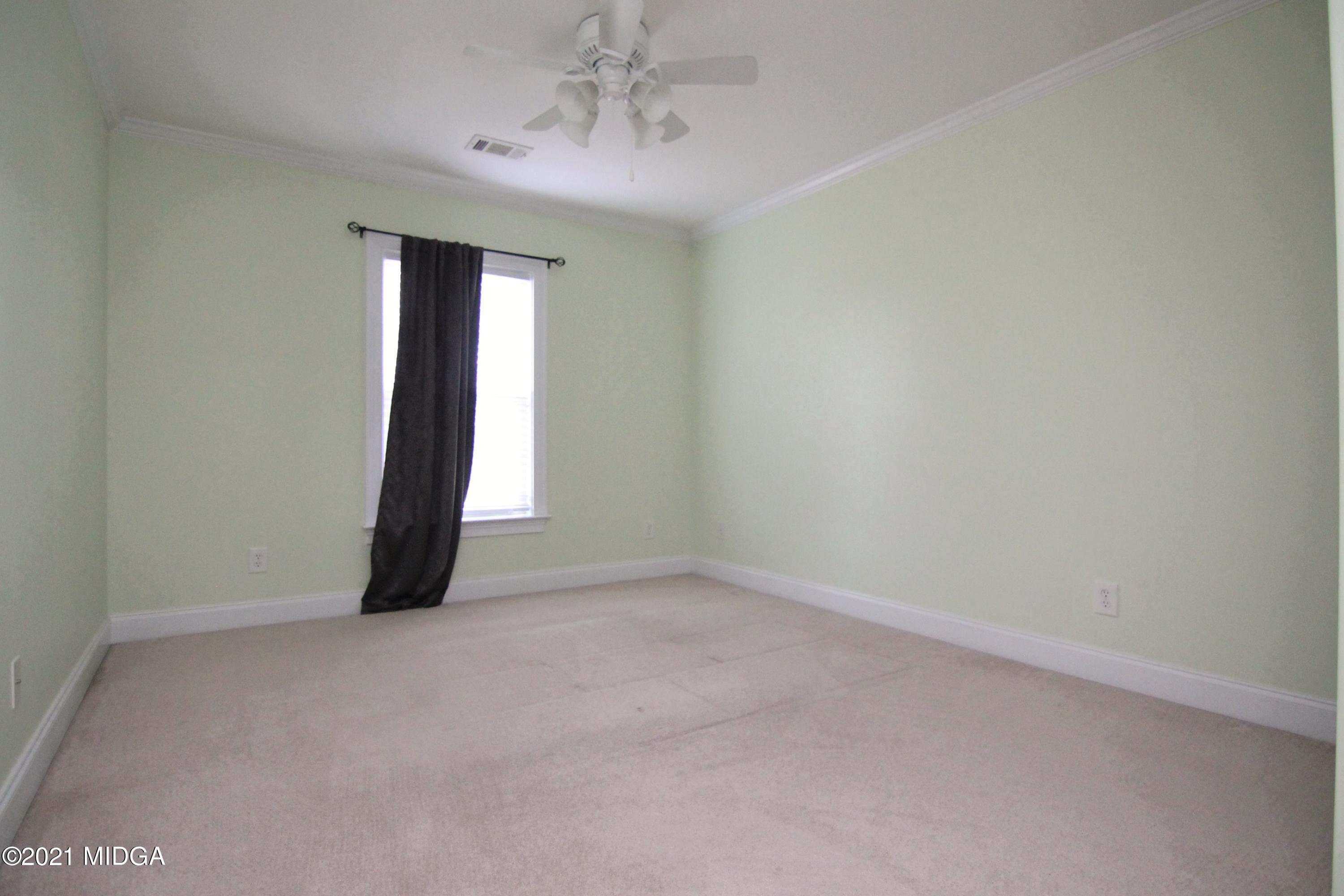 629 Toomer Road Perry, GA 31069 - Photo 39 of 59 a view of an empty room with a window