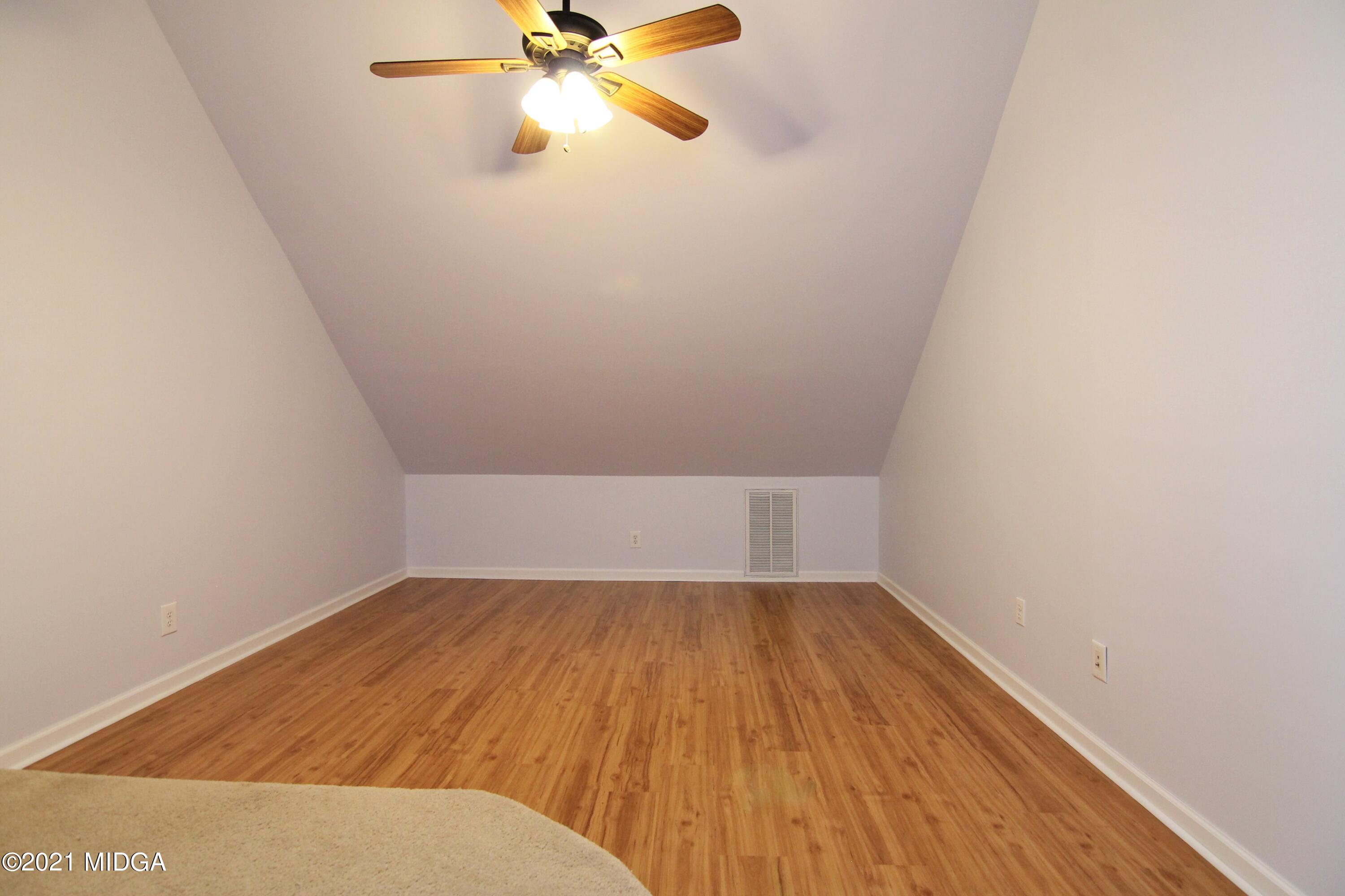 629 Toomer Road Perry, GA 31069 - Photo 43 of 59 a view of a room with wooden floor and a window