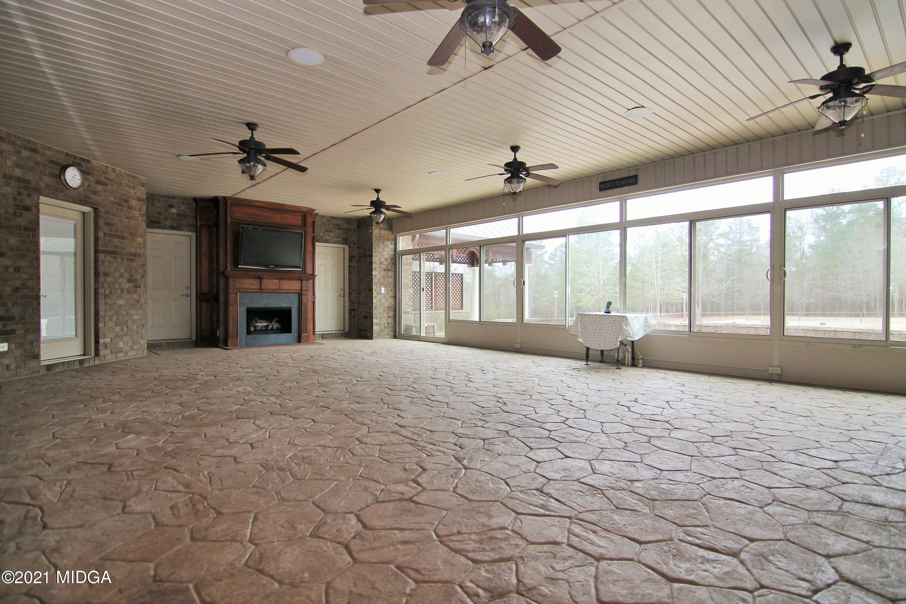 629 Toomer Road Perry, GA 31069 - Photo 48 of 59 a big room with chandelier and windows