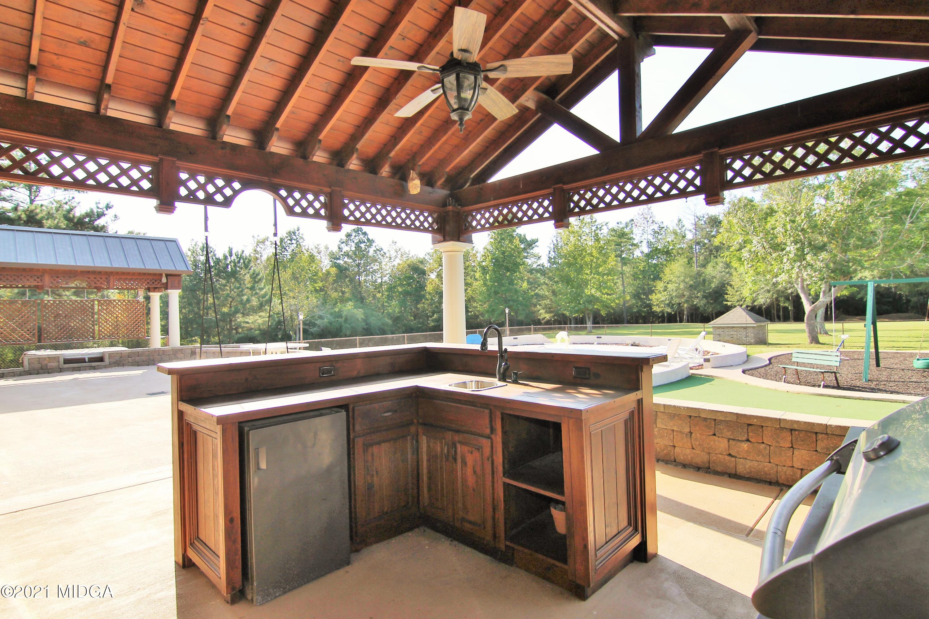 629 Toomer Road Perry, GA 31069 - Photo 53 of 59 a kitchen with a stove and a sink