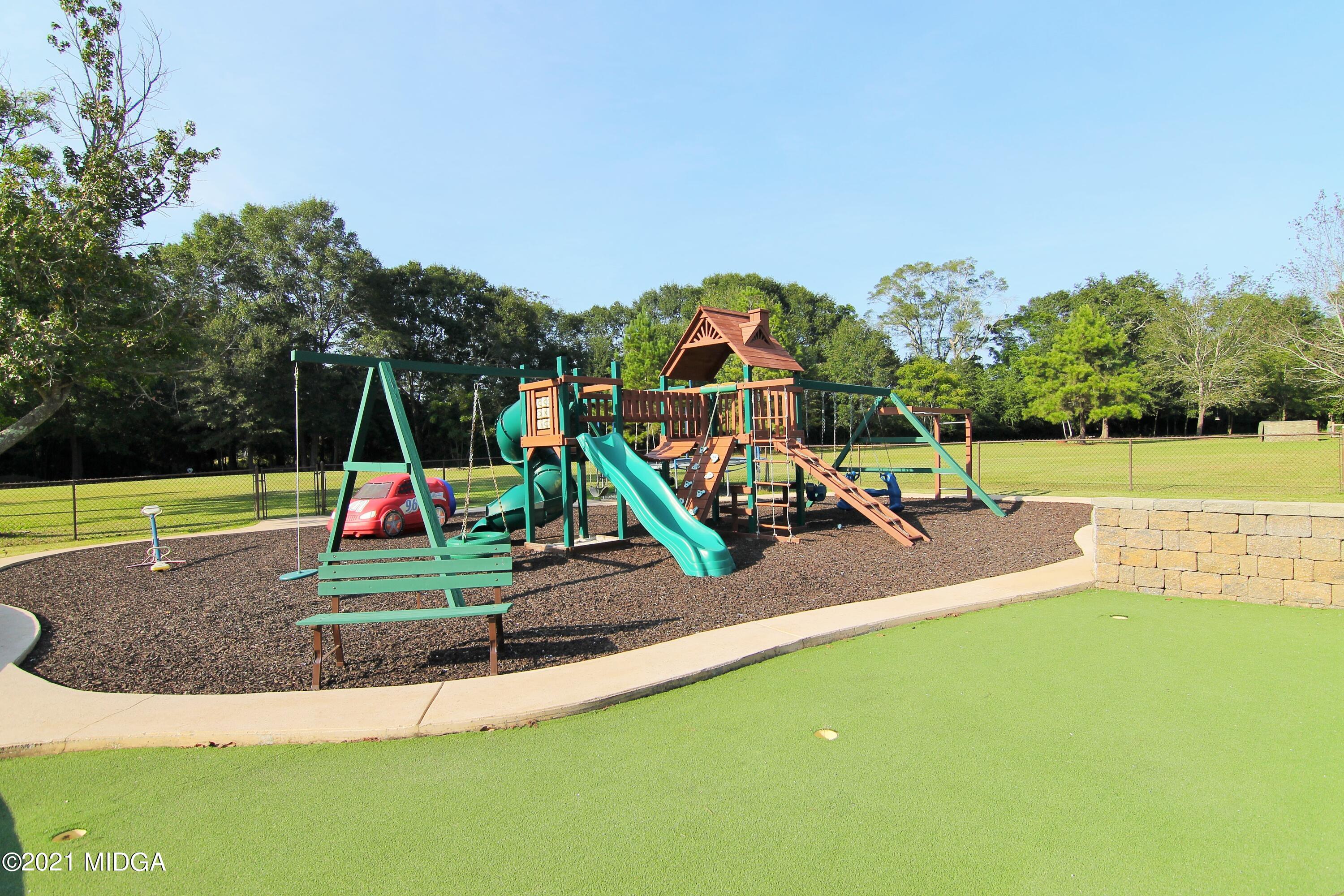 629 Toomer Road Perry, GA 31069 - Photo 55 of 59 a view of a park with swings