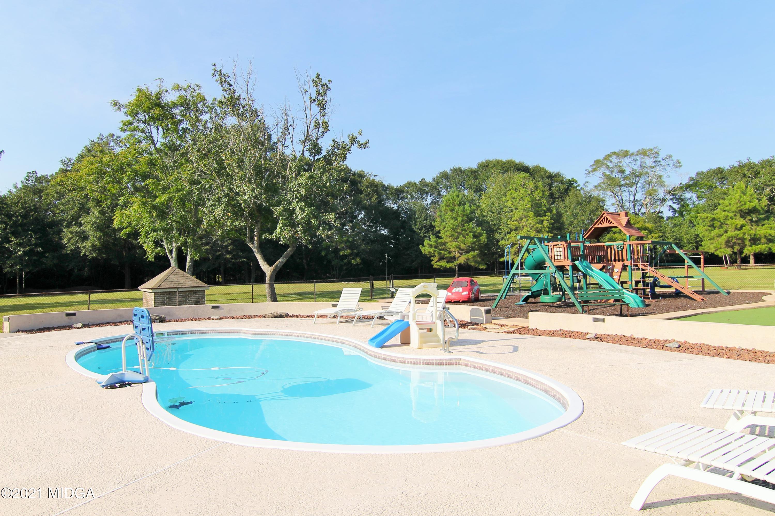 629 Toomer Road Perry, GA 31069 - Photo 56 of 59 a view of a swimming pool with a patio