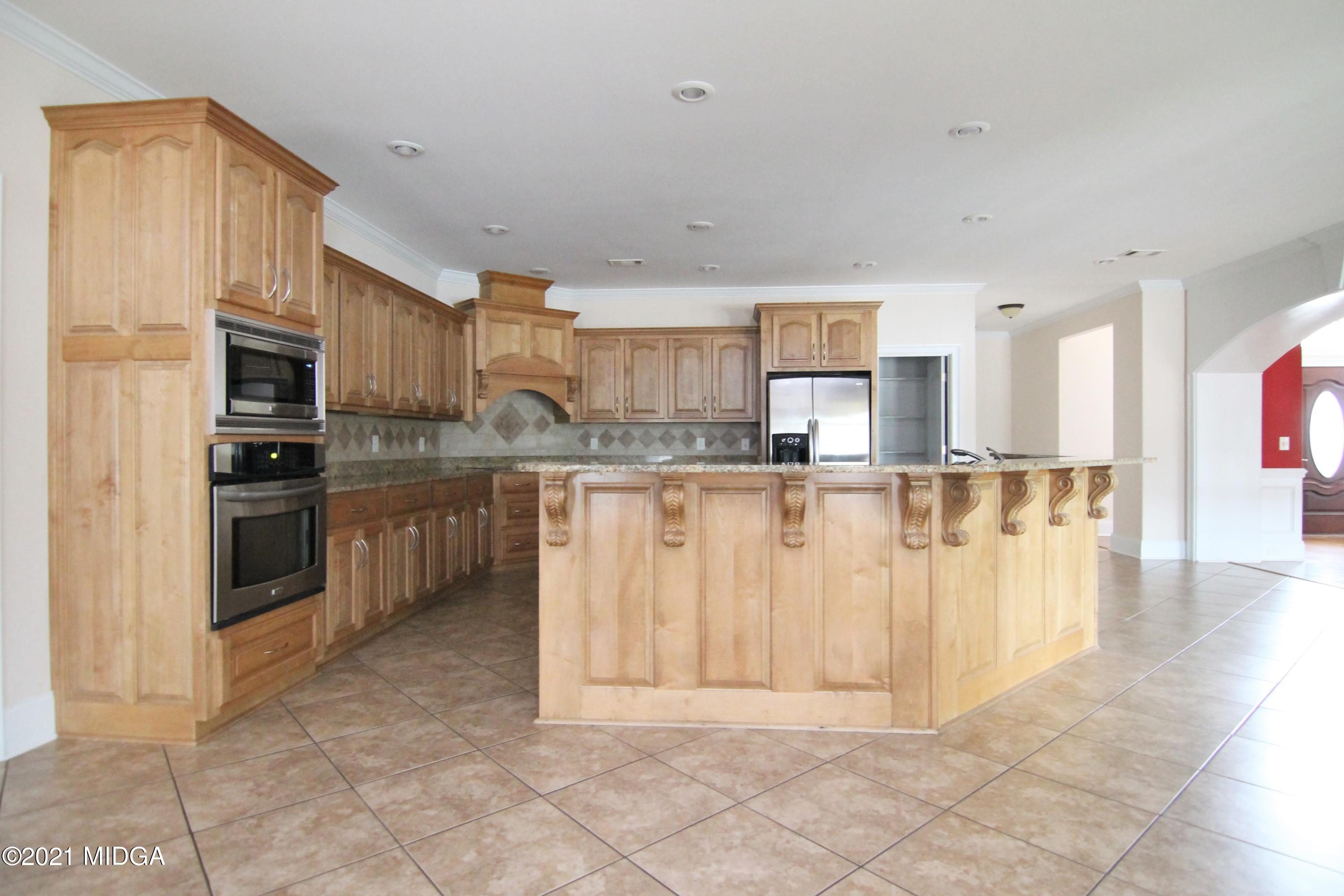 629 Toomer Road Perry, GA 31069 - Photo 9 of 59 a view of kitchen with stainless steel appliances granite countertop lots of counter top space and cabinets