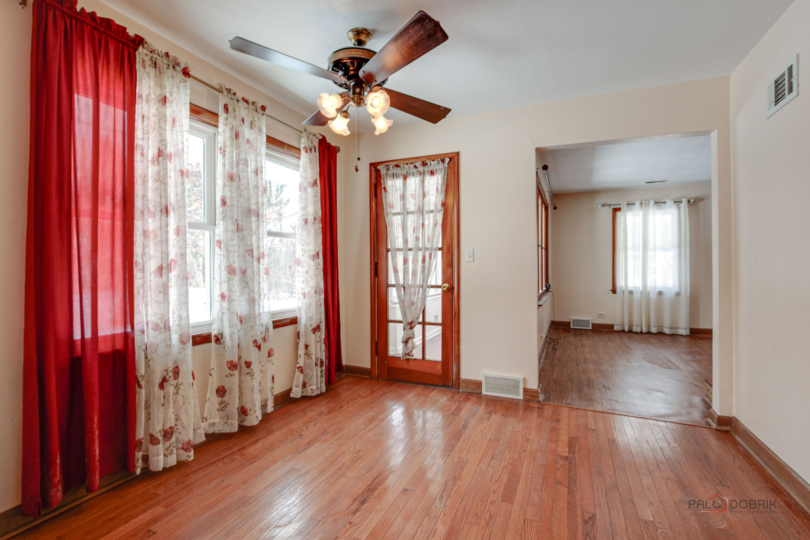 15983 West Wadsworth Road Wadsworth, IL 60083 - Photo 14 of 33 wooden floor in an empty room with a window
