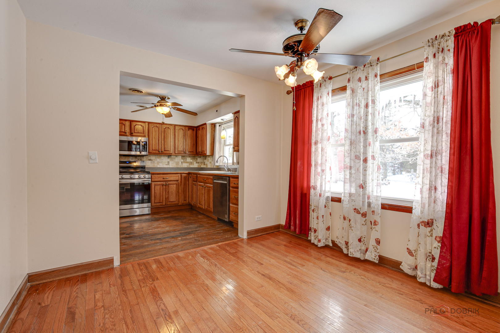 15983 West Wadsworth Road Wadsworth, IL 60083 - Photo 15 of 33 wooden floor in an empty room with a window