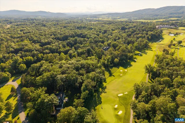 a view of a lake with mountains in the background