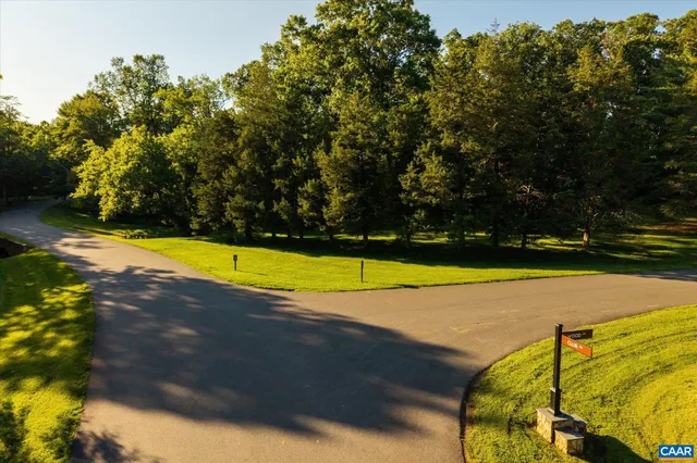 a view of a swimming pool with an outdoor space and seating area