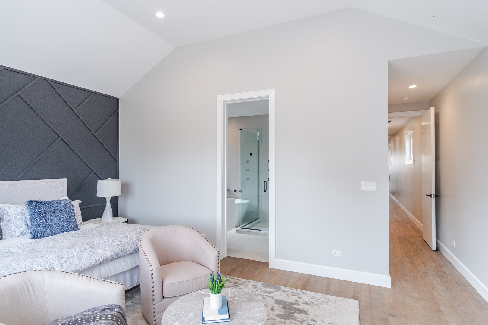 4639 South Indiana Avenue Chicago, IL 60615 - Photo 15 of 24 a bedroom with a bed and hallway