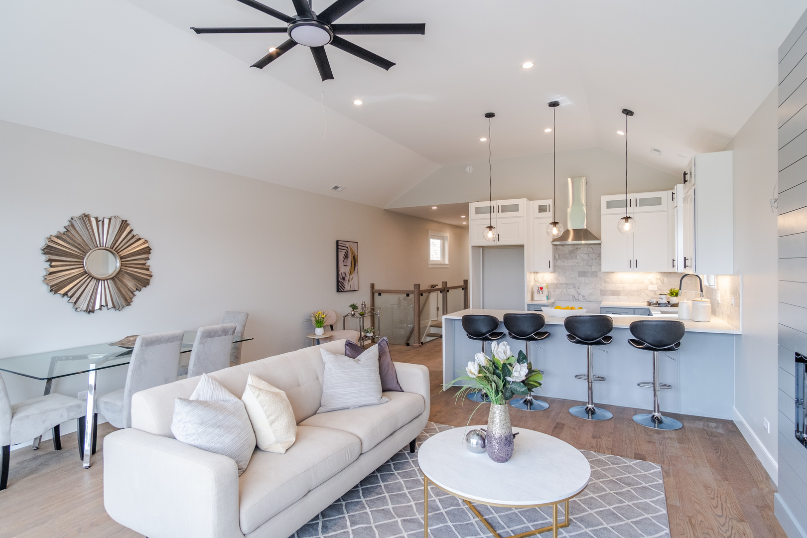 4639 South Indiana Avenue Chicago, IL 60615 - Photo 4 of 24 a living room with furniture kitchen view and a chandelier