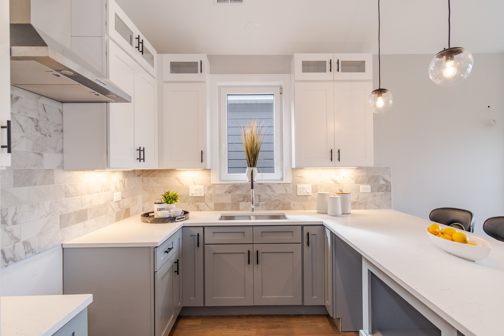 4639 South Indiana Avenue Chicago, IL 60615 - Photo 7 of 24 a kitchen with a sink cabinets and wooden floor