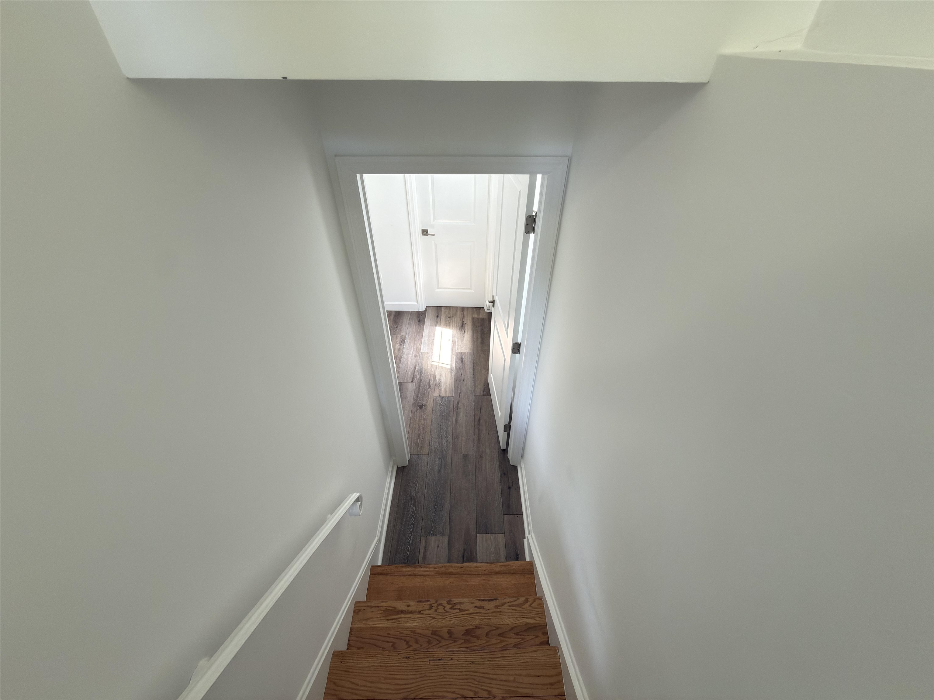 531 Day Avenue, Unit 1 Ridgefield, NJ 07657 - Photo 27 of 32 a view of a hallway with wooden floor