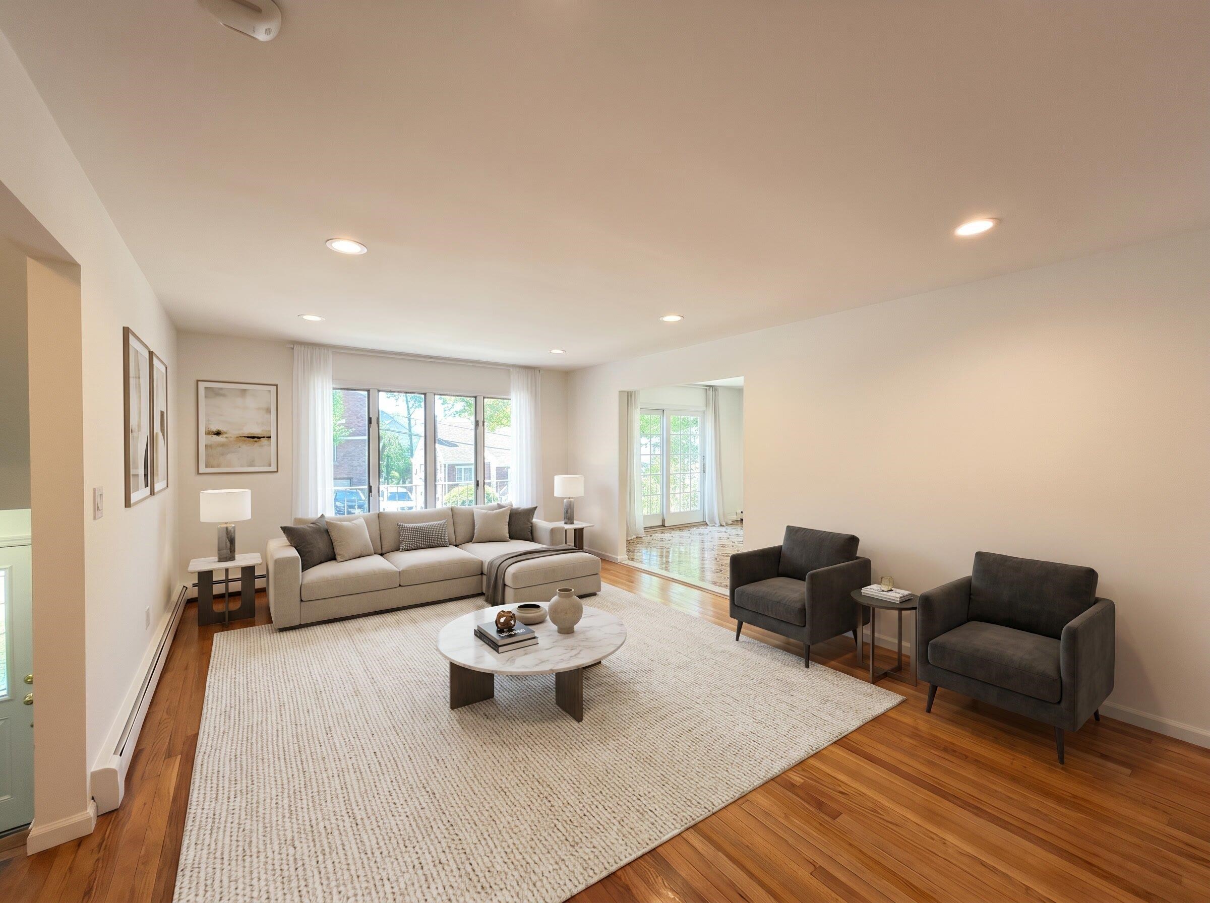 531 Day Avenue, Unit 1 Ridgefield, NJ 07657 - Photo 3 of 32 a living room with furniture or couch and a large window