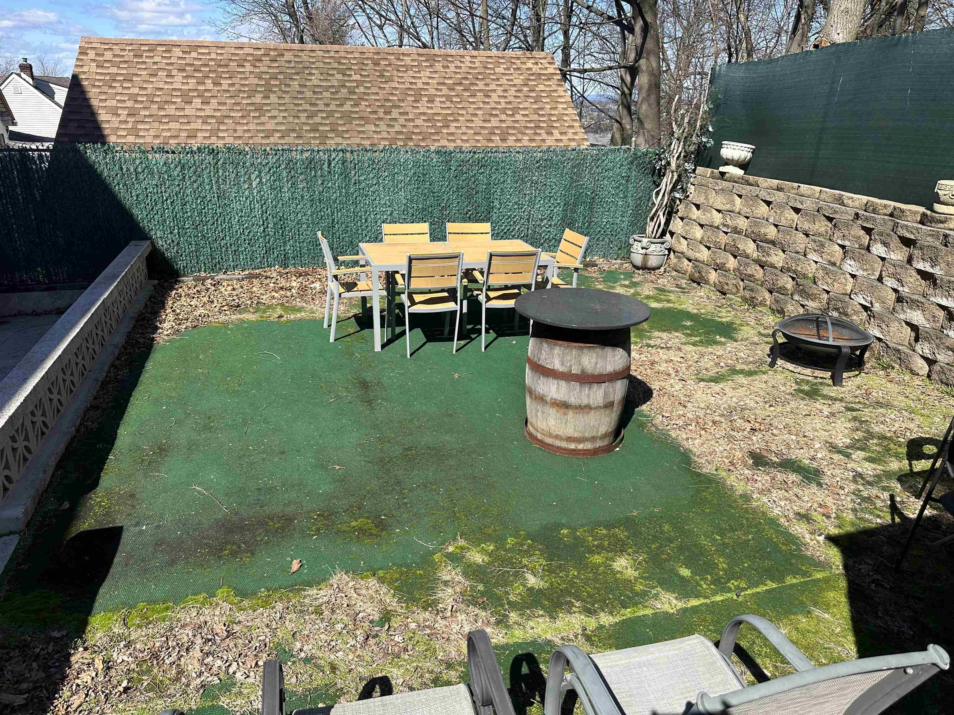 531 Day Avenue, Unit 1 Ridgefield, NJ 07657 - Photo 32 of 32 a backyard of a house with table and chairs