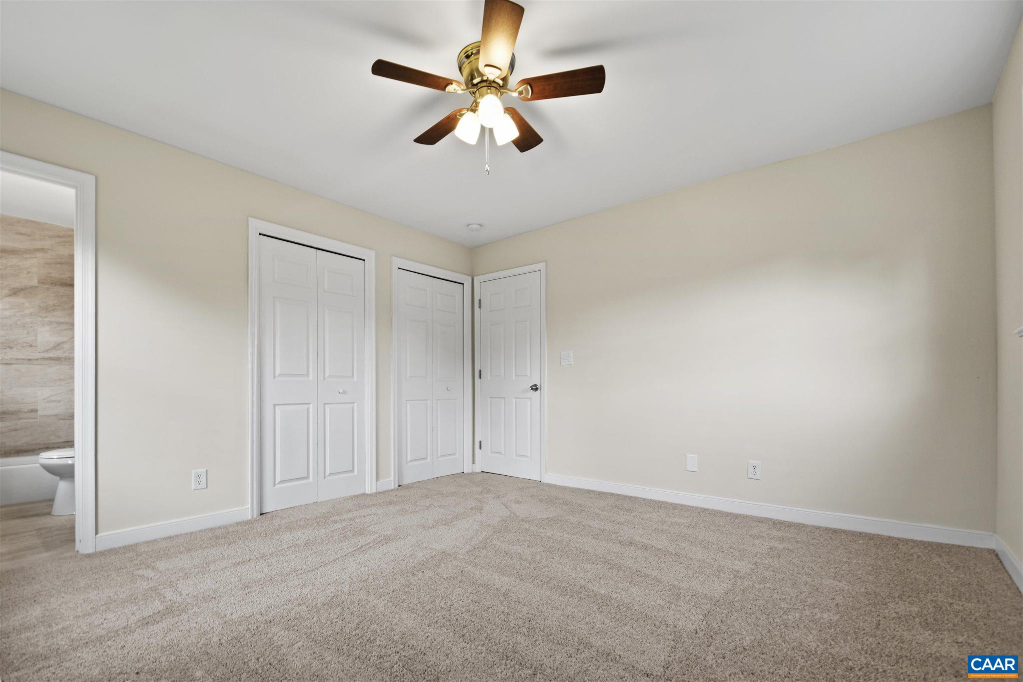 2614 Huntington Road Charlottesville, VA 22901 - Photo 14 of 29 an empty room with chandelier fan