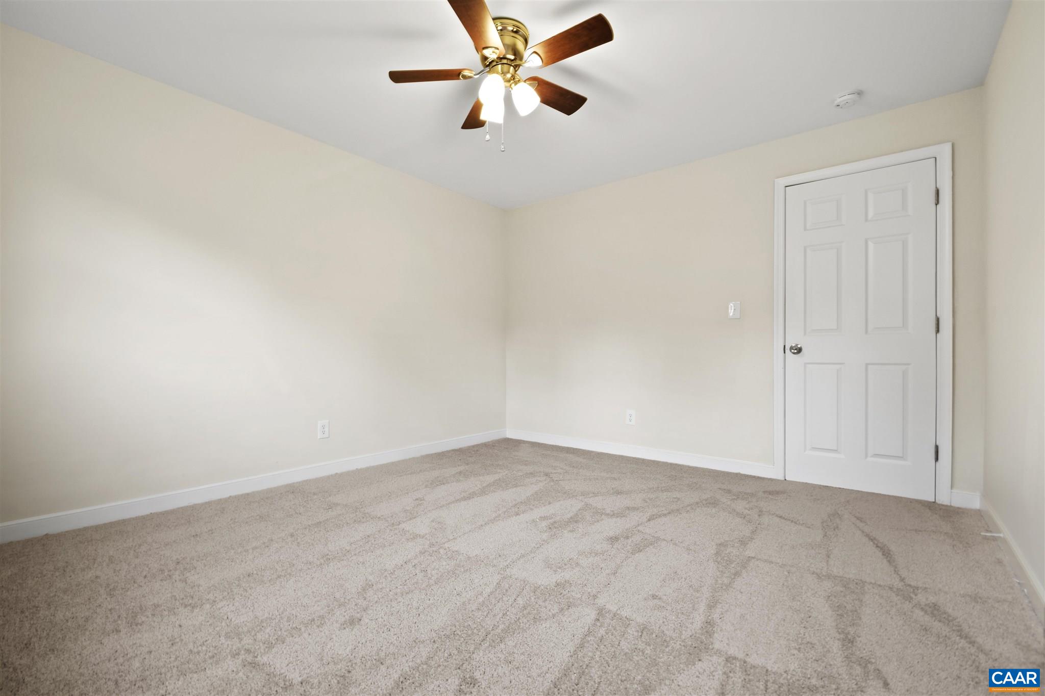 2614 Huntington Road Charlottesville, VA 22901 - Photo 20 of 29 an empty room with windows and fan