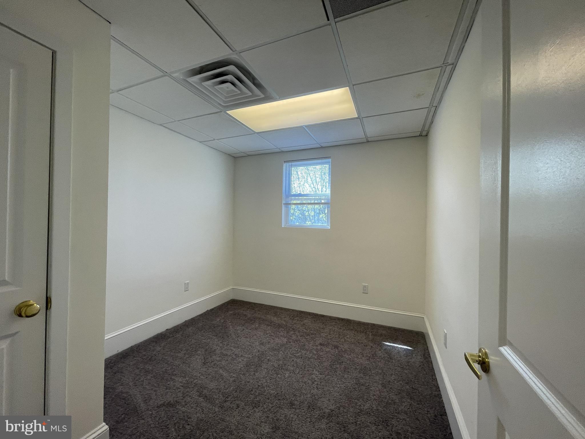 200 High Street West Glassboro, NJ 08028 - Photo 11 of 14 a view of a hallway with a window