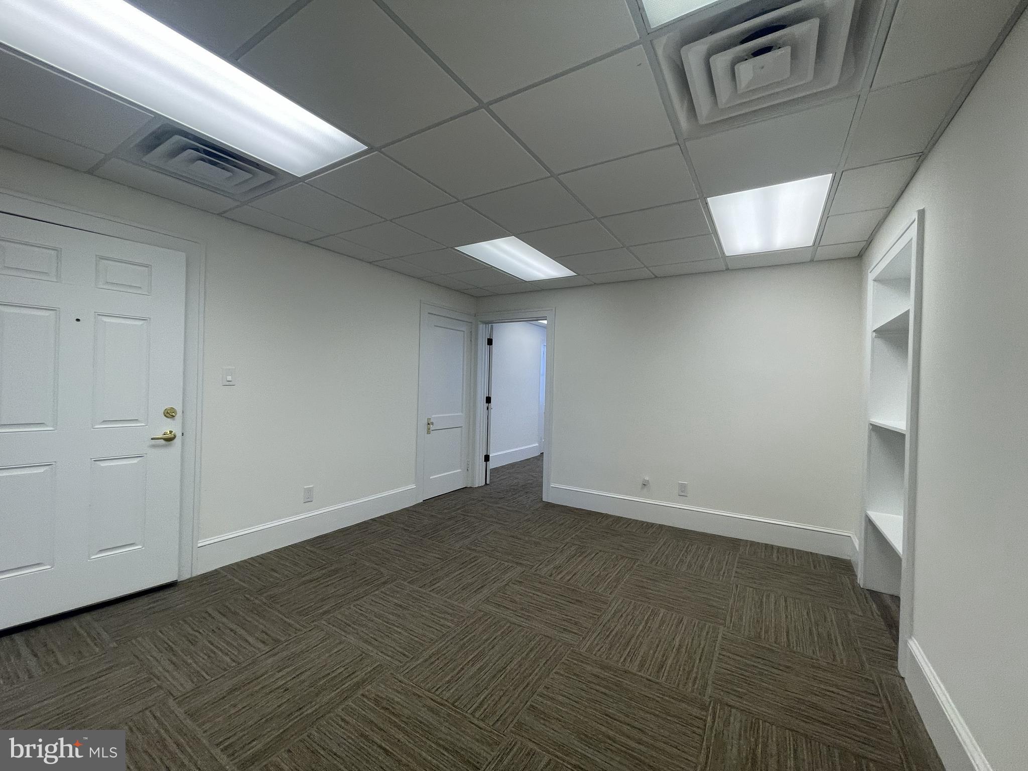 200 High Street West Glassboro, NJ 08028 - Photo 6 of 14 a view of an empty room with windows