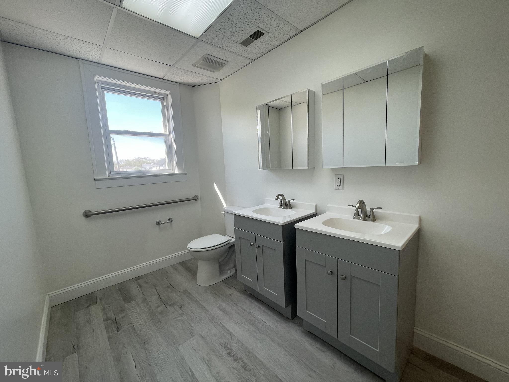 200 High Street West Glassboro, NJ 08028 - Photo 9 of 14 a view of bathroom with a sink toilet and vanity