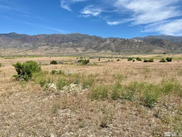 a view of mountain view with mountains in the background