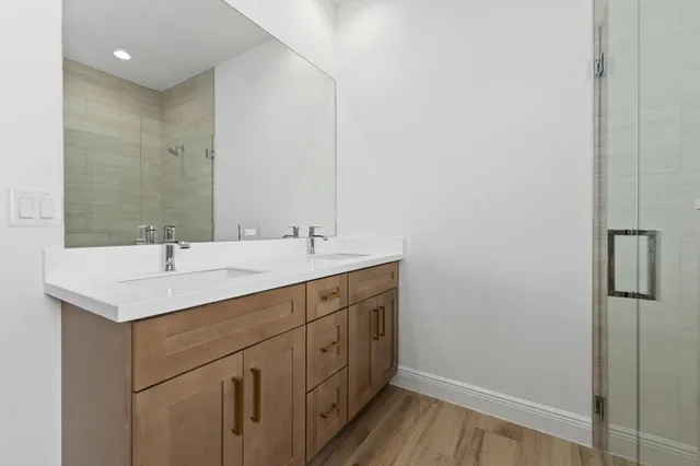 a bathroom with a sink and a mirror