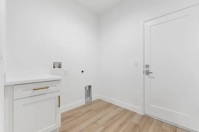 a view of small space with wooden floor