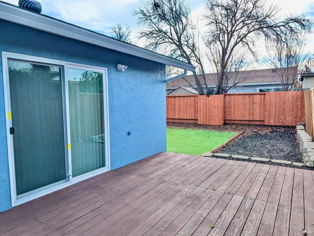 a view of a backyard with a garden