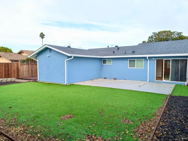 a house view with a garden space