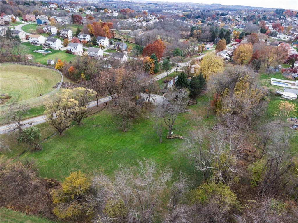 3024 Hyland Road Irwin, PA 15642 - Photo 11 of 45 an aerial view of residential houses with outdoor space and trees