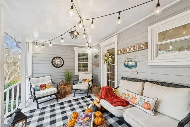 a living room with a couch and a table