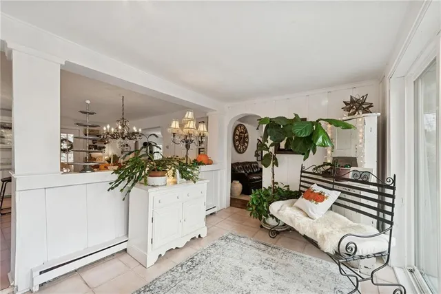 a view of living room filled with furniture and a living room