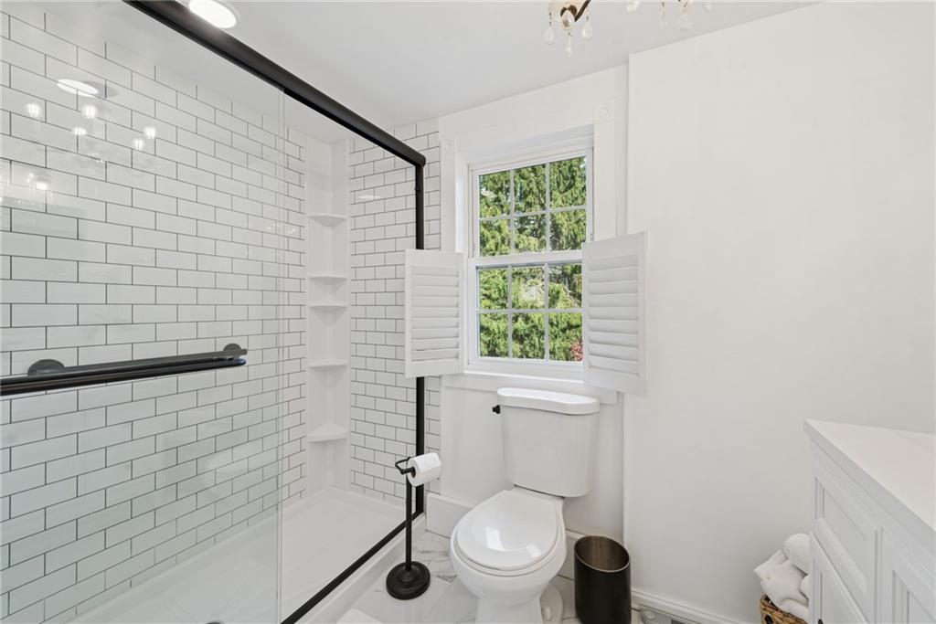 3024 Hyland Road Irwin, PA 15642 - Photo 31 of 45 a bathroom with a toilet and a shower