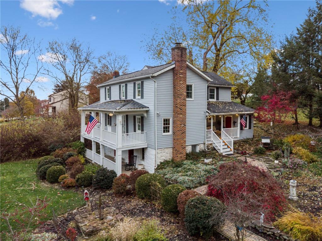 3024 Hyland Road Irwin, PA 15642 - Photo 44 of 45 a front view of a house with a garden